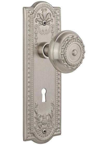 Meadows Door Set with Matching Knobs and Keyhole Single Dummy in Satin Nickel.